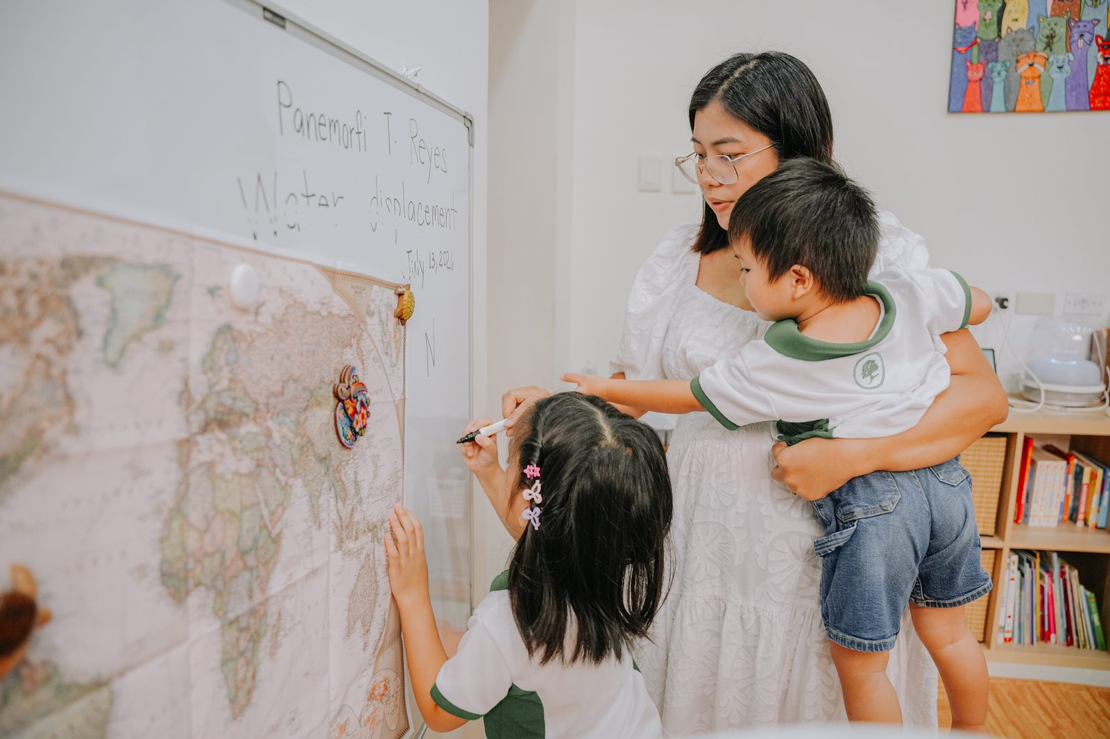 Mai and her children during a Charlotte Mason lesson